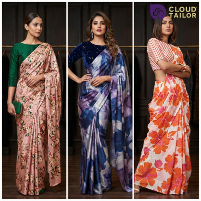 Three women modeling stylish Printed sarees, including a pink, blue, and orange floral print saree. A perfect showcase of modern printed saree designs.