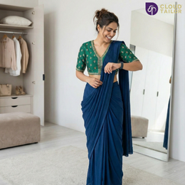 Smiling woman wearing a tailored saree from CloudTailor